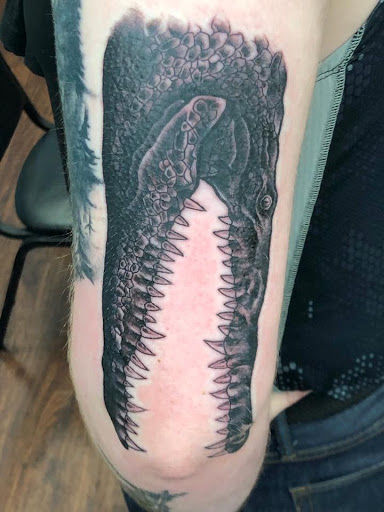 Find tattoo ideas western for your next unique tattoo in Houghton Lake at Screaming Eagle Tattoo