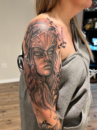 Explore fire sign tattoo ideas, creative tattoo ideas in Elko, available at Freedom Tattoo