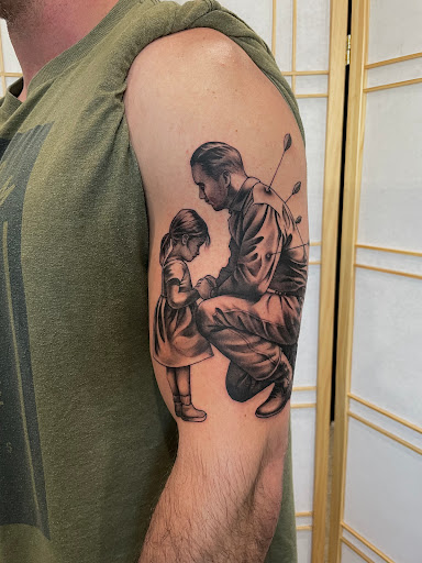 Find cool armband tattoo ideas for your next unique tattoo in Bakersfield at Treat Me Nice Tattoo