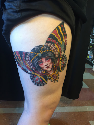 Explore lion and cub tattoo ideas, creative tattoo ideas in Laramie, available at Vintage Electric Tattoo