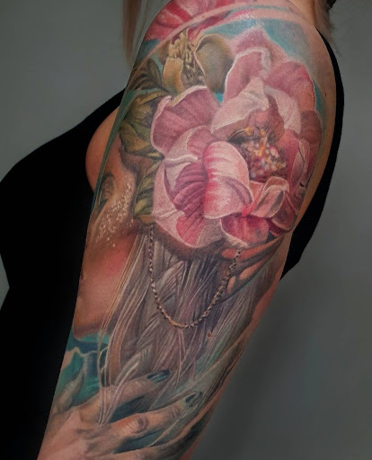 Explore calf tattoo ideas for females, creative tattoo ideas in Millsboro, available at Tattoo Galaxy (Millsboro) Piercing & Custom tattoos