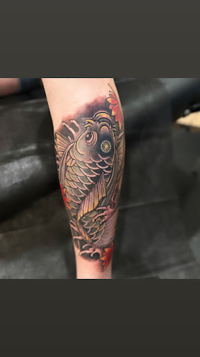 Explore torn skin tattoo ideas, creative tattoo ideas in Beverly Hills, available at Inked Zen