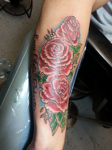 Explore tattoo ideas for men lower arm, creative tattoo ideas in Spencer, available at Ink Envy Tattoo And Body Piercing