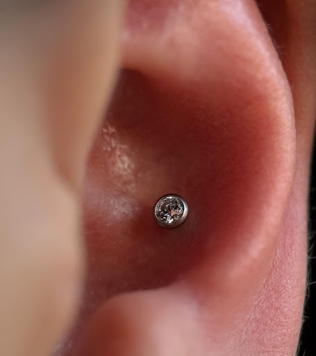 Explore throat tattoo ideas for females, creative tattoo ideas in Modesto, available at MyRadiantBody - Piercing in Modesto