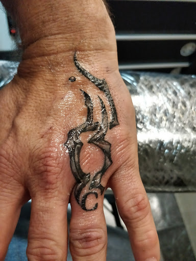 Explore nursing tattoo ideas, creative tattoo ideas in Rogers, available at Jimmy Romance Tattoo & Body Piercing