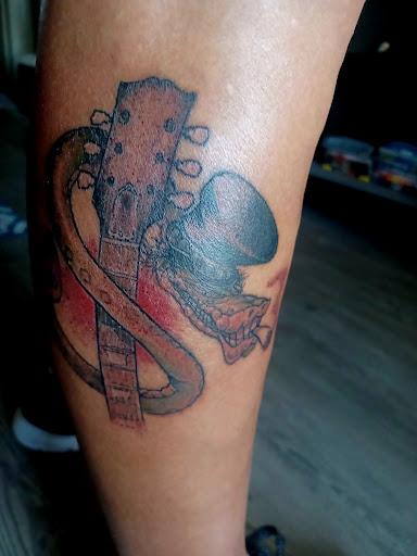 Explore upper back tattoo ideas for guys, creative tattoo ideas in San Diego, available at Sideshow Tattoo and Piercing