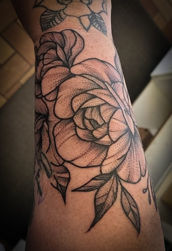 Explore mens thigh tattoo ideas, creative tattoo ideas in Lander, available at Blackblood Tattoo and Piercing