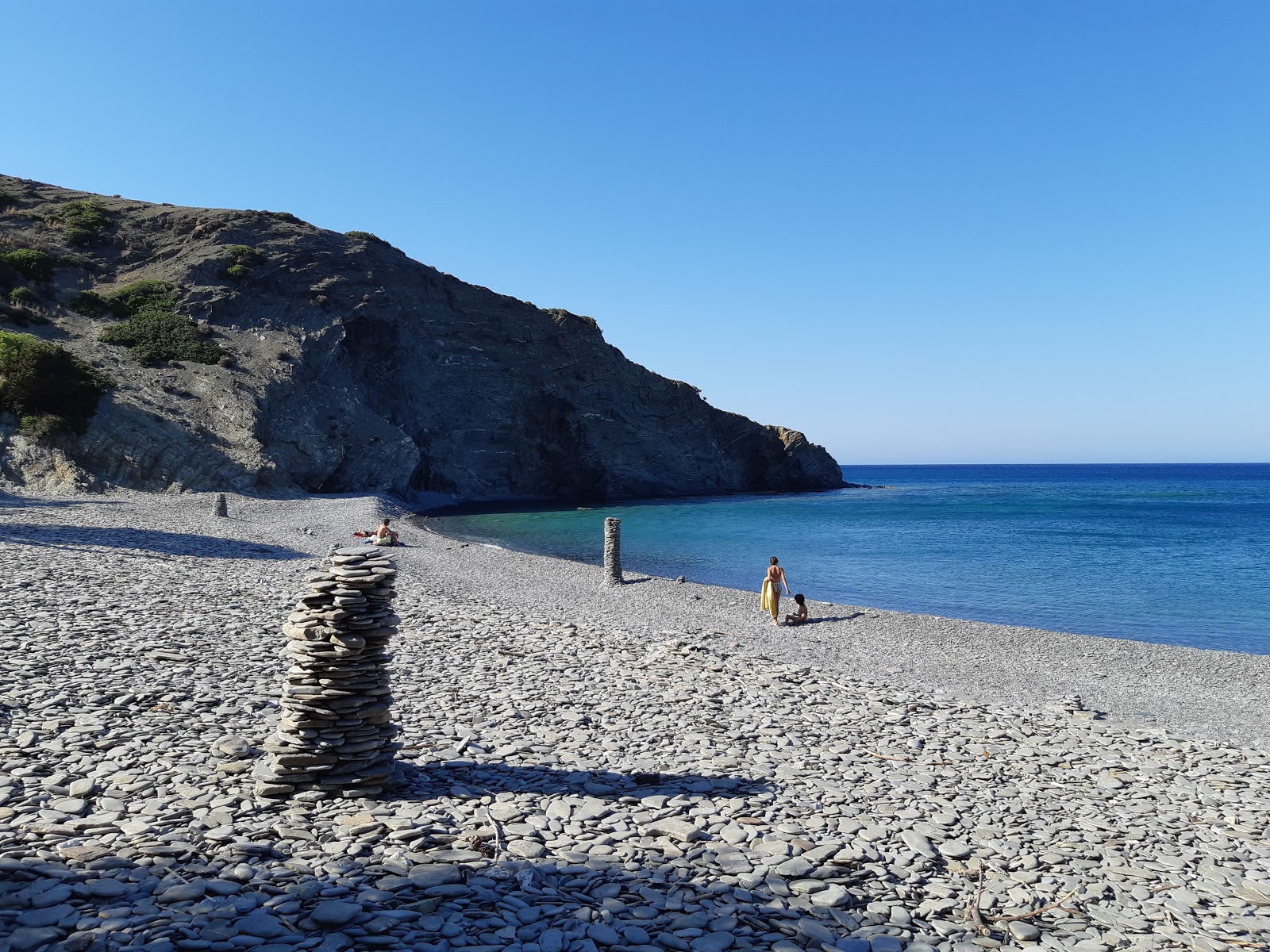 Fotografija Papa Minas Beach z sivi kamenček površino