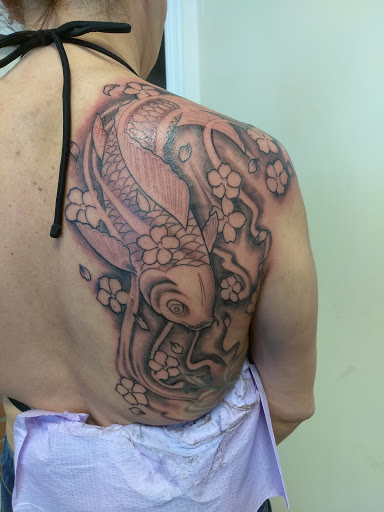 Tattoo Shop «The Lizard Lounge Tattoo Kissimmee», reviews and photos, 4519 S Orange Blossom Trail, Kissimmee, FL 34746, USA