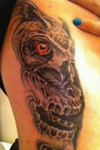 Explore earlobe tattoo ideas, creative tattoo ideas in Fort Mohave, available at RedRum Tattoo & Body Piercing Co.