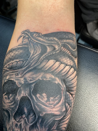 Explore pectoral tattoo ideas, creative tattoo ideas in Loveland, available at Single Needle Tattoo