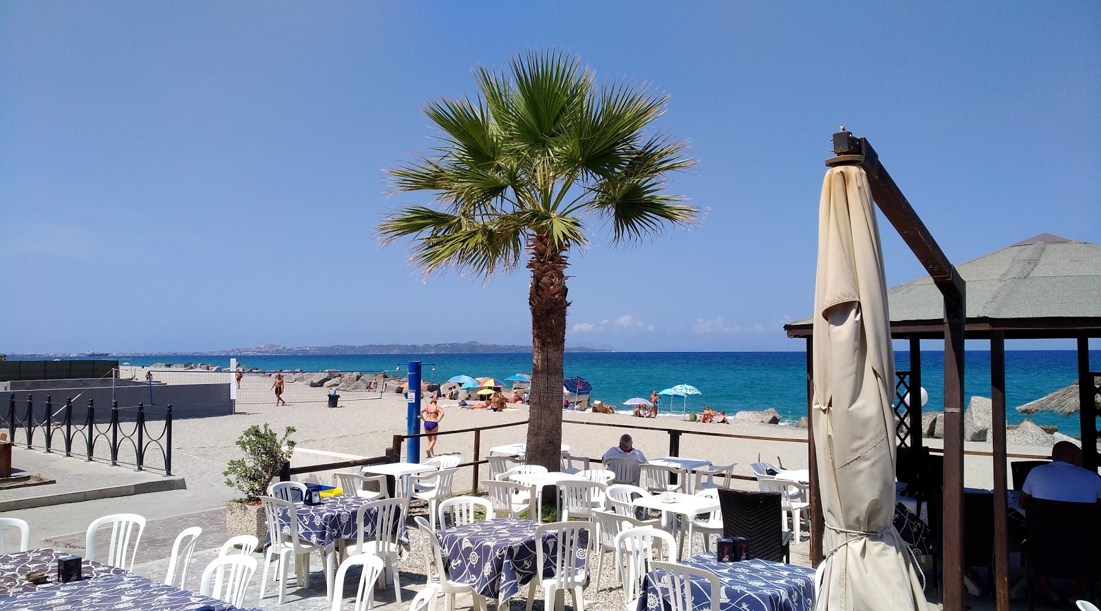 Fotografija Venetico Marina beach z visok stopnjo čistoče