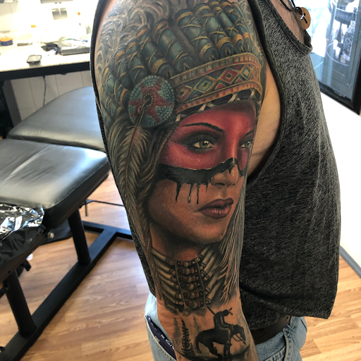 Explore indiana jones tattoo ideas, creative tattoo ideas in Sarasota, available at SEVEN SINS Tattoo Studio