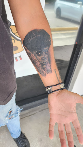 Explore italian tattoo ideas for guys, creative tattoo ideas in Largo, available at Alchemy Tattoos and Body Piercings