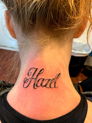 Explore ironman triathlon tattoo ideas, creative tattoo ideas in Seymour, available at American Gypsy Tattoo Corp.