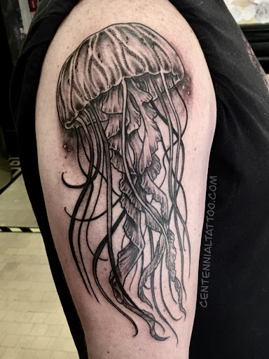 Explore hand tattoo ideas, creative tattoo ideas in Salida, available at Centennial Tattoo