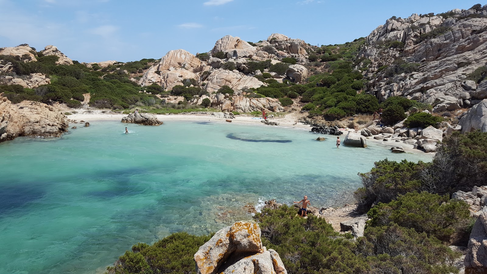 Foto von Cala Napoletana mit weißer sand Oberfläche