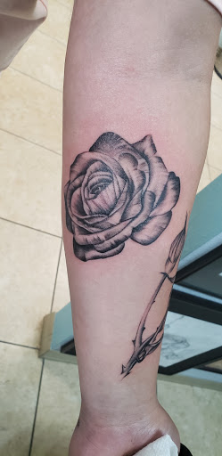 Explore scale tattoo ideas, creative tattoo ideas in Orlando, available at Dungeon Tattoos & Body Piercing