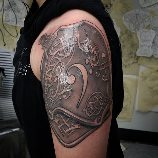 Explore hand tattoos ideas for men, creative tattoo ideas in Leesburg, available at Trademark Body Art