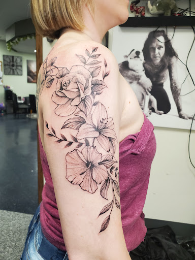 Explore snake tattoo ideas for guys, creative tattoo ideas in Saint Paul, available at Iron Rhino Tattoo