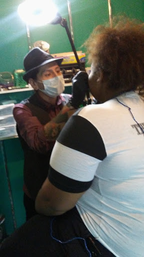 Explore st michael tattoo ideas, creative tattoo ideas in Saint Louis, available at Enigma Tattoos & Body Piercings