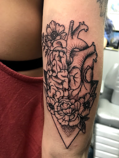 Explore mikasa tattoo ideas, creative tattoo ideas in Muncie, available at The Tattoo Studio