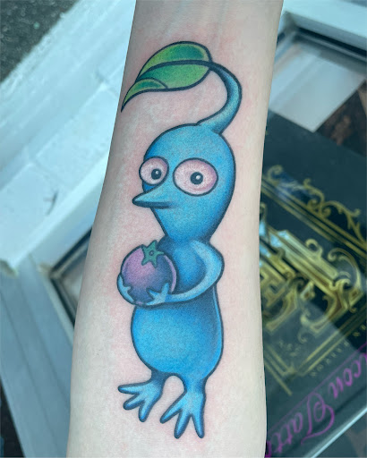 Explore side neck tattoo ideas, creative tattoo ideas in Chapel Hill, available at Golden Falcon Tattoo and Piercing