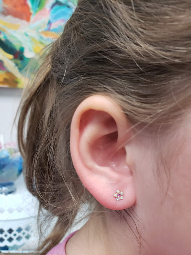 Explore outdoor tattoo ideas, creative tattoo ideas in Bellevue, available at Just Your Ears Piercing & Permanent Jewelry Studio