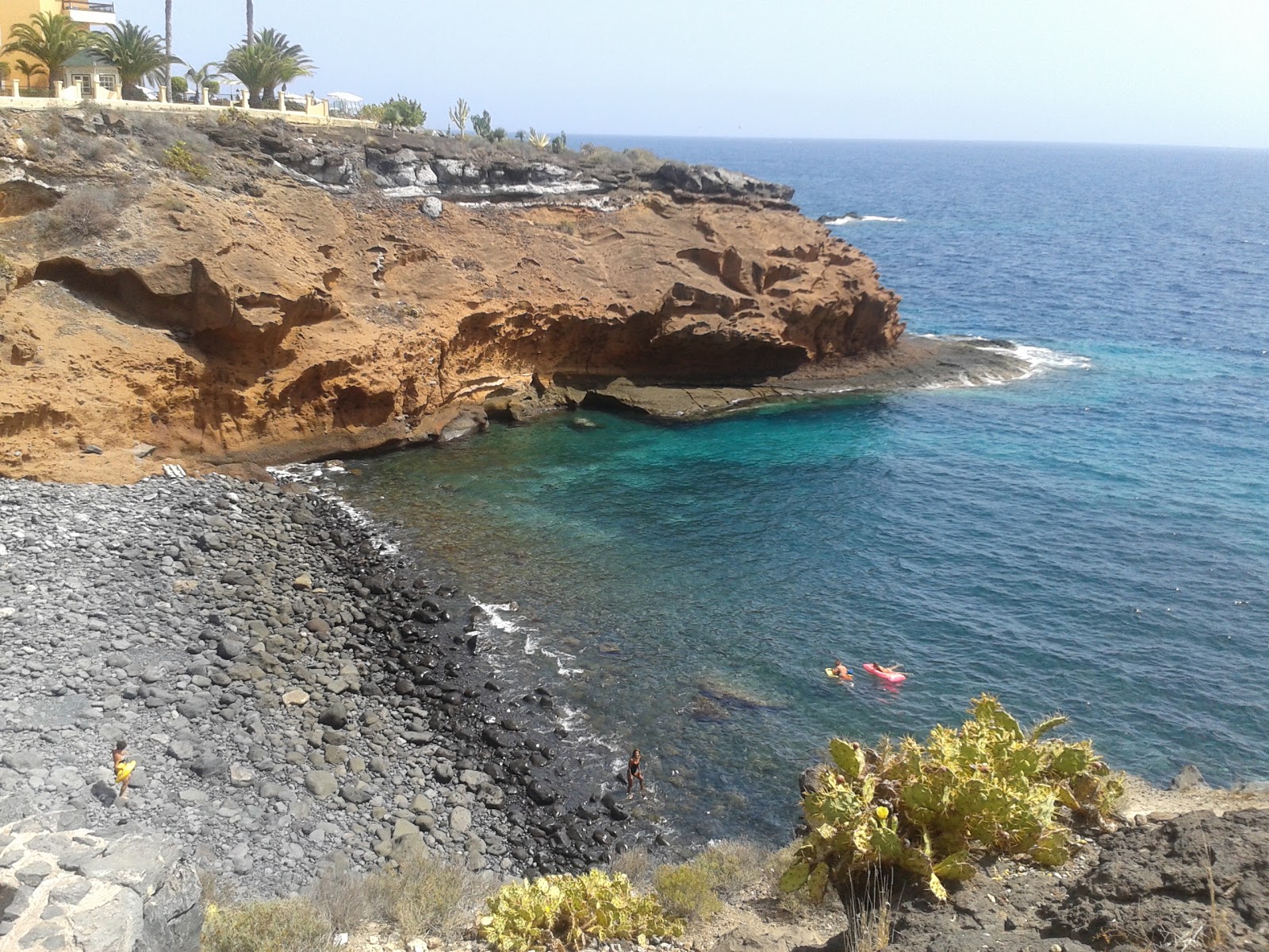 Photo of Playa Las Salinas with rocks cover surface