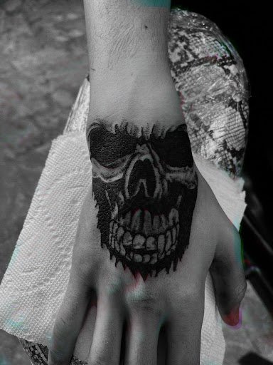 Find meaningful tattoo ideas for guys for your next unique tattoo in Seymour at American Gypsy Tattoo Corp.