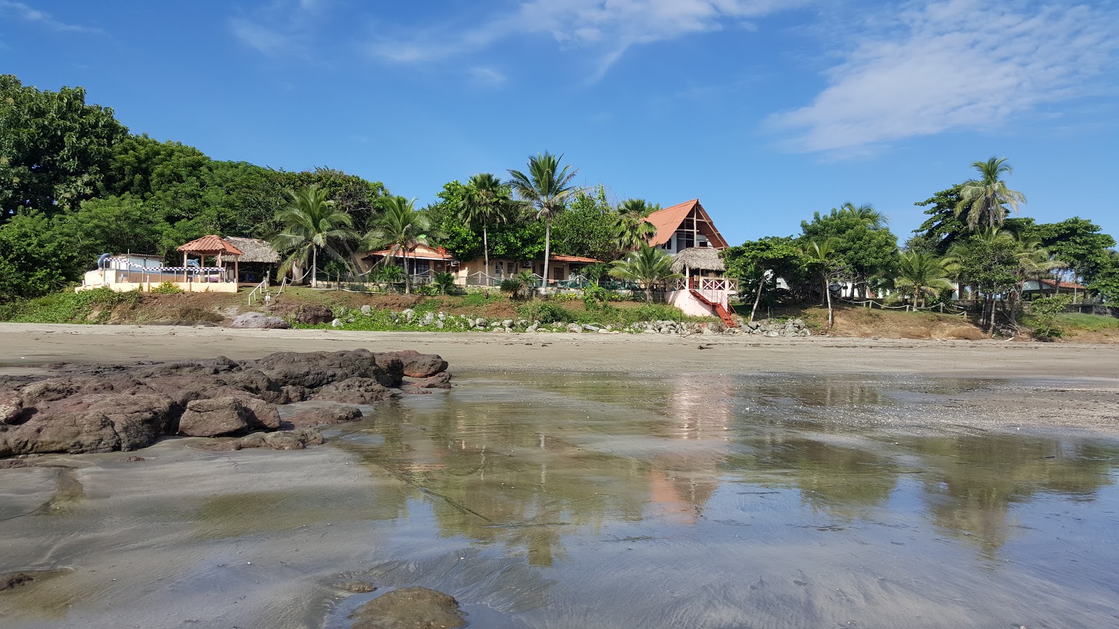 Foto af Ojo de Agua Beach med lang lige kyst