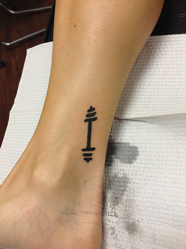 Explore tiger lily tattoo ideas, creative tattoo ideas in Seymour, available at American Gypsy Tattoo Corp.