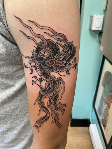 Explore birth flower tattoo ideas, creative tattoo ideas in Delaware, available at Rose & Web Tattoo