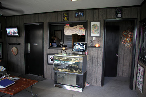 Explore dragonfly tattoo ideas for guys, creative tattoo ideas in Nashville, available at ArtWerks Studios