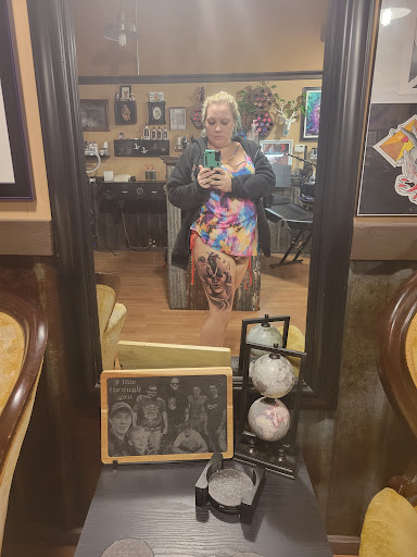 Explore hunting sleeve tattoo ideas, creative tattoo ideas in Boonville, available at Spring St. Ink Gallery