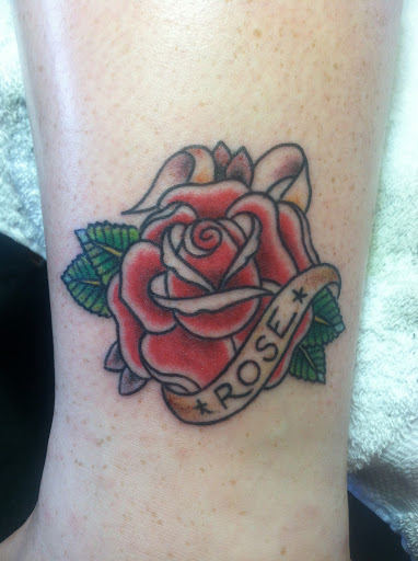 Explore cover up tattoo ideas on thigh, creative tattoo ideas in Reno, available at Aces Tattoo