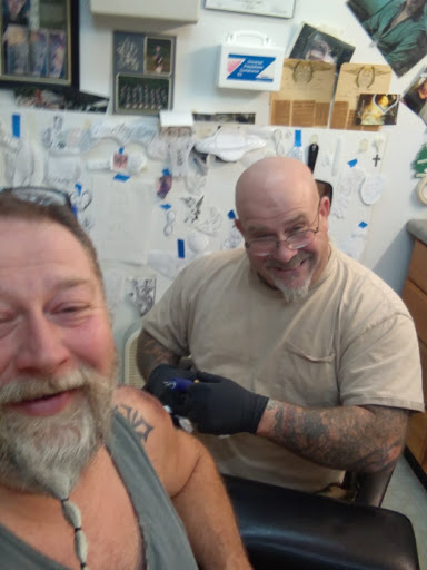 Explore good small tattoo ideas for guys, creative tattoo ideas in Madison Heights, available at Billy Powells Ink Works Tattoo & Piercing