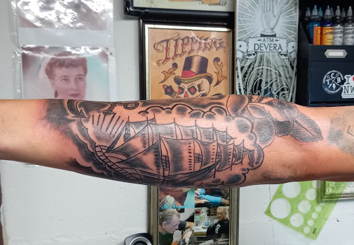 Explore dog collar tattoo ideas, creative tattoo ideas in Meridian, available at SK-Tattoo1