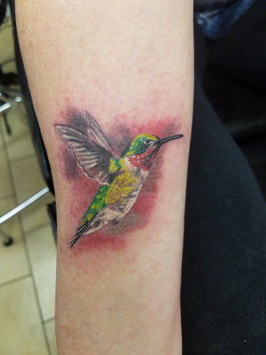 Tattoo Shop «magnum opus tattoo company», reviews and photos, 1817 Padre Blvd #4, South Padre Island, TX 78597, USA