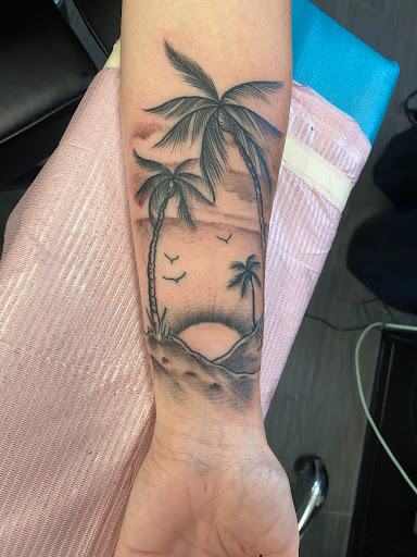 Explore peace tattoo ideas, creative tattoo ideas in Palm Harbor, available at Angry Owl Tattoo and Piercing