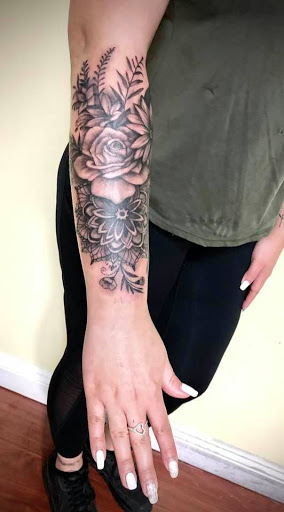 Explore floral hand tattoo ideas, creative tattoo ideas in Garden Grove, available at Anna Hang Tattoo