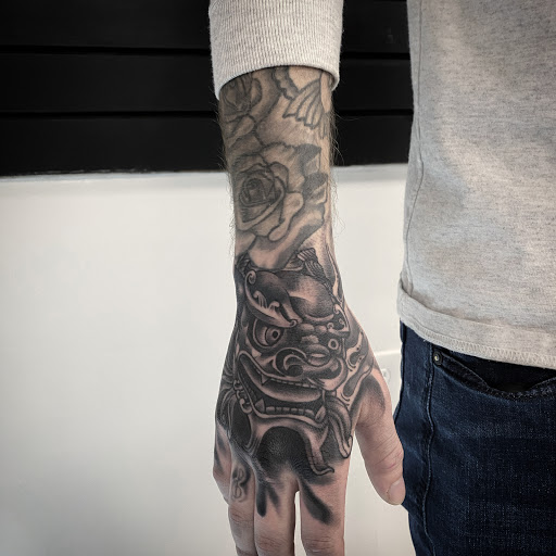 Explore leg tattoo ideas black male, creative tattoo ideas in Belleville, available at Dark Horse Tattoo Company, LLC