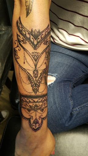 Explore elbow tattoo ideas for guys, creative tattoo ideas in Athens, available at United Ink Tattoos and Body Piercings