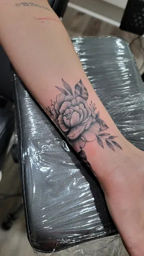 Explore american football tattoo ideas, creative tattoo ideas in Tampa, available at Private Ink Studio