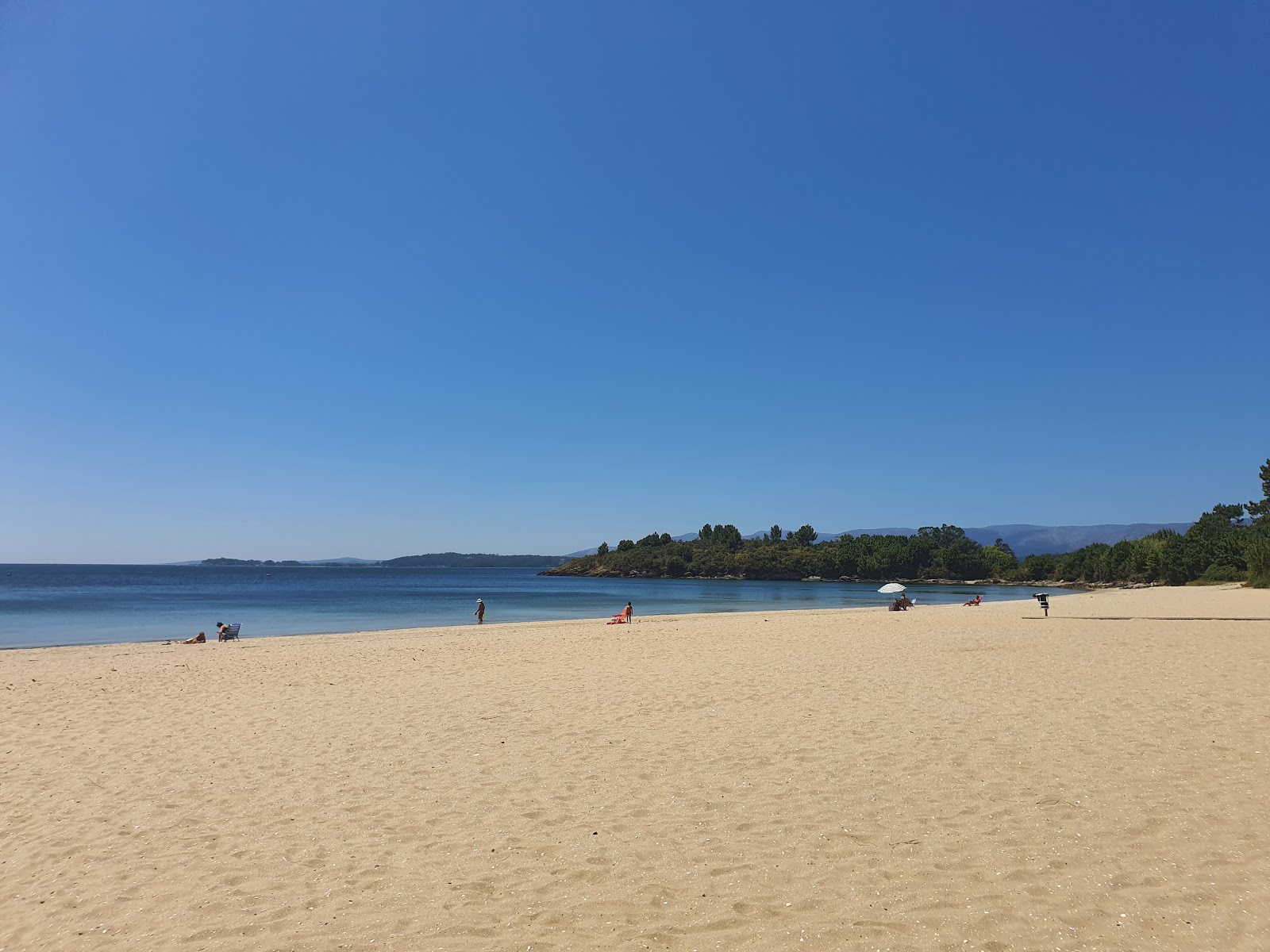 Zdjęcie Beach das Cunchas z powierzchnią beżowy piasek