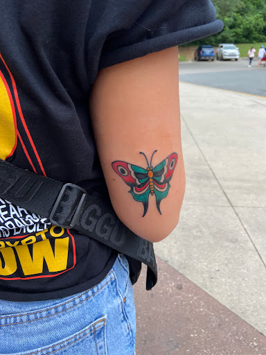 Explore womens sternum tattoo ideas, creative tattoo ideas in Tallahassee, available at Hot Love Tattoo