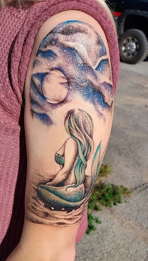 Explore cute girl tattoo ideas, creative tattoo ideas in Boonville, available at UYS Under Your Skin Tattoos and Piercings