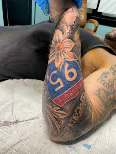 Explore aquarius tattoo ideas female, creative tattoo ideas in Orange Park, available at Big City Tattoo and Piercing