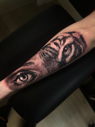 Explore malcolm x tattoo ideas, creative tattoo ideas in Tampa, available at Legacy ink tattoos