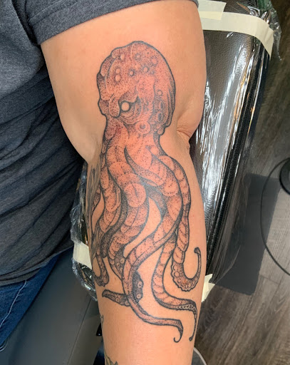 Explore stained glass tattoo ideas, creative tattoo ideas in Galena, available at Emerald Buddha Tattoo